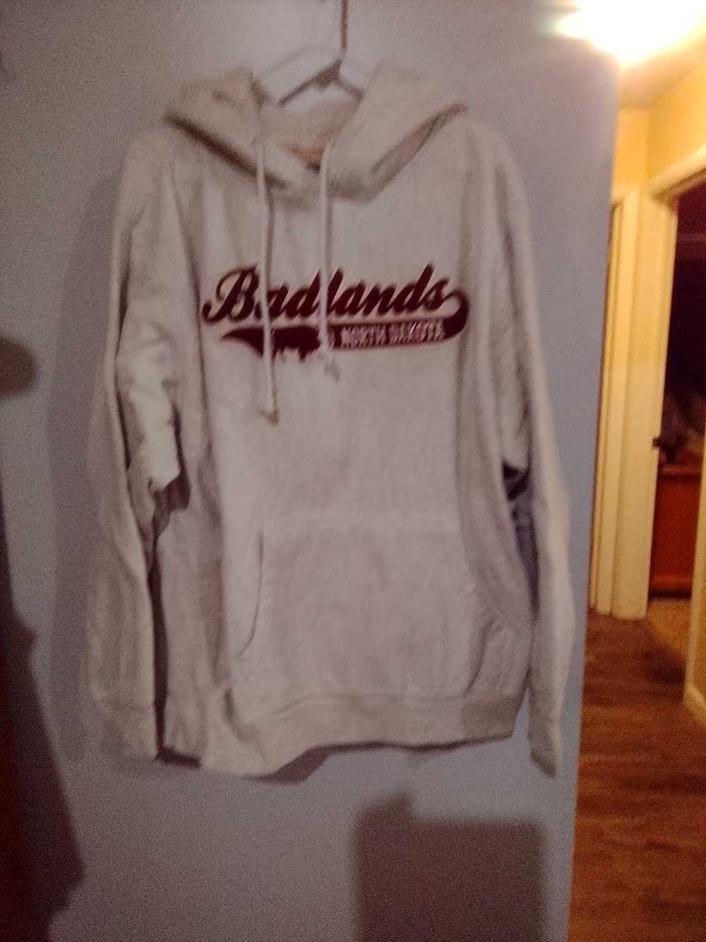 Cream Pullover Hoodie with Maroon 'Badlands' Logo